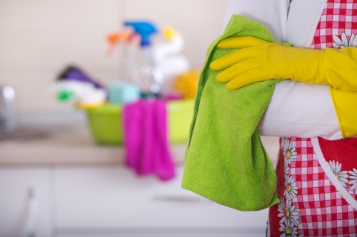 Local technician carrying out deep upholstery cleaning in Ilford