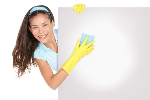 Odour treatment being applied to a stained rug or carpet